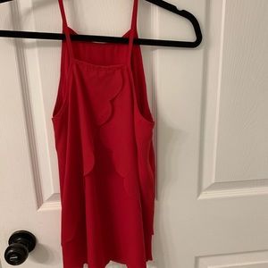 Red tank with scalloped detail on bottom